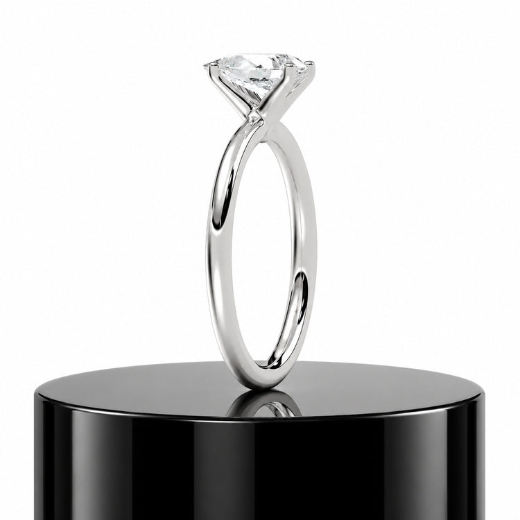 Pear Solitaire Ring