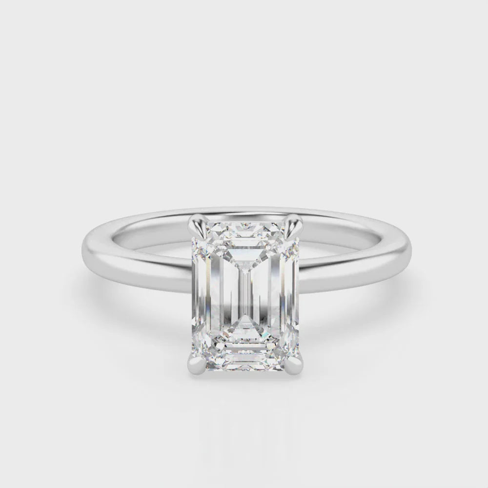 EMMA 2.0 – 4 CLAW 2CT EMERALD CUT SOLITAIRE